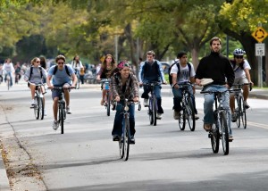 Students riding bikes on the UC Davis campus.